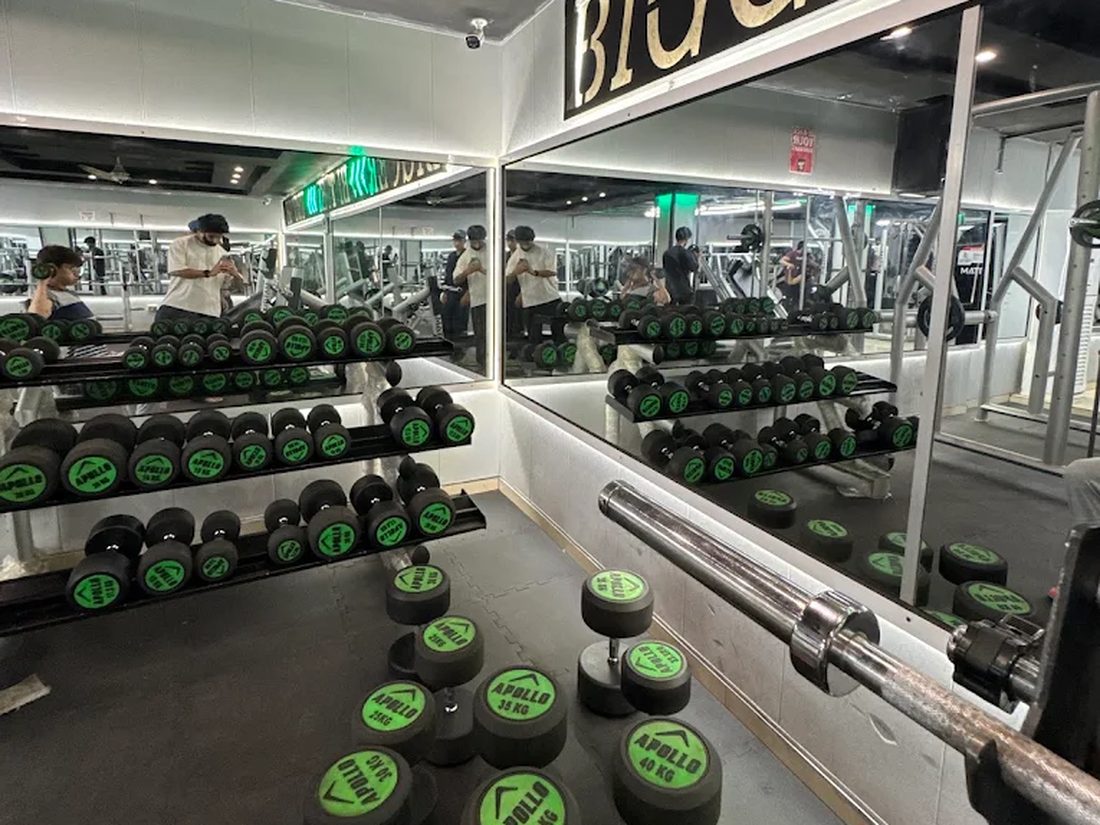 Apollo dumbbell racks in the free-weight area