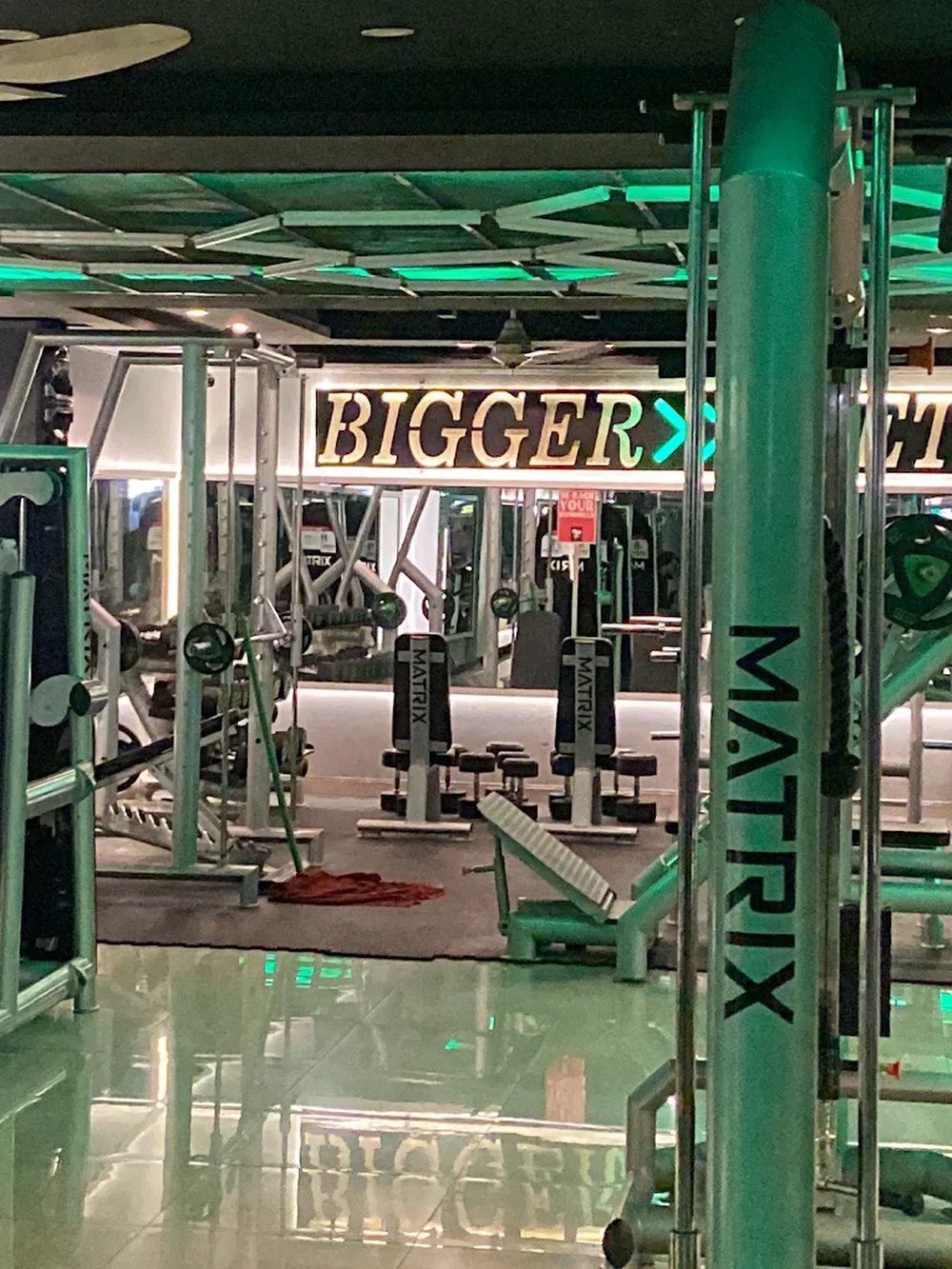 Matrix strength equipment beneath the Bigger signage