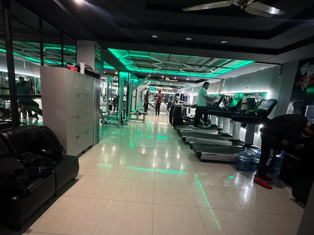View along the main training floor toward the cardio section
